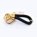 Schwarzgold – Eleganter Schlüsselanhänger im maritimen Stil